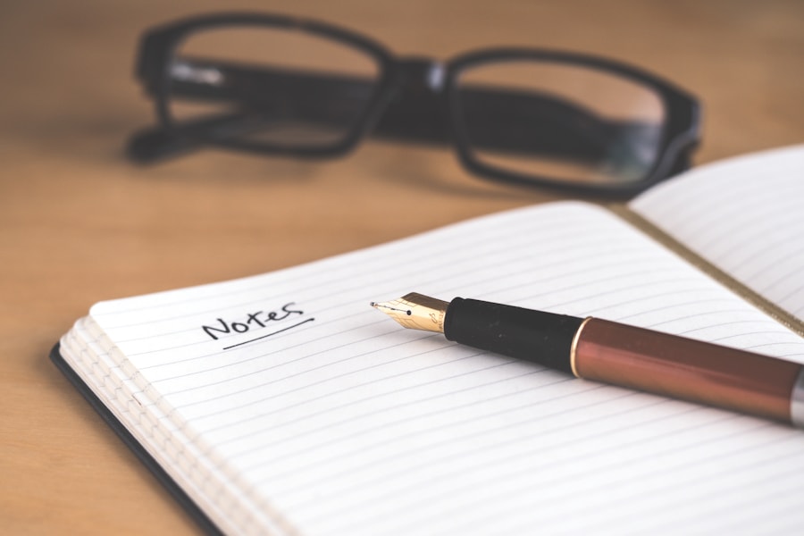 Notebook and pen on a desk, previewing the task board project